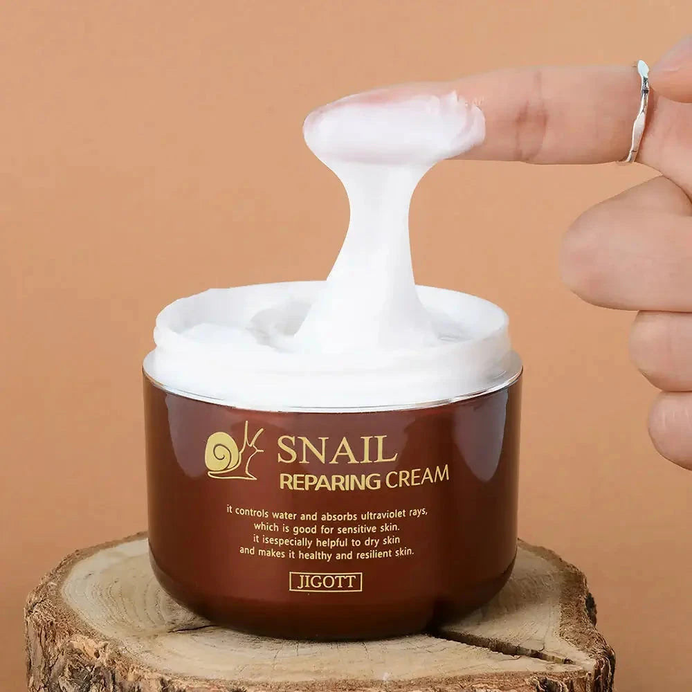 Atjaunojošs krēms sejai Jigott Snail Repairing Cream