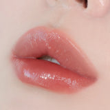 Mitrinošs lūpu spīdums-tinte ar mirdzuma efektu UNLEASHIA Berry Shot Lip Tint